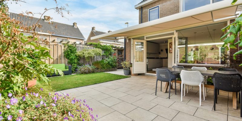 A delightful courtyard with a freshly mown lawn